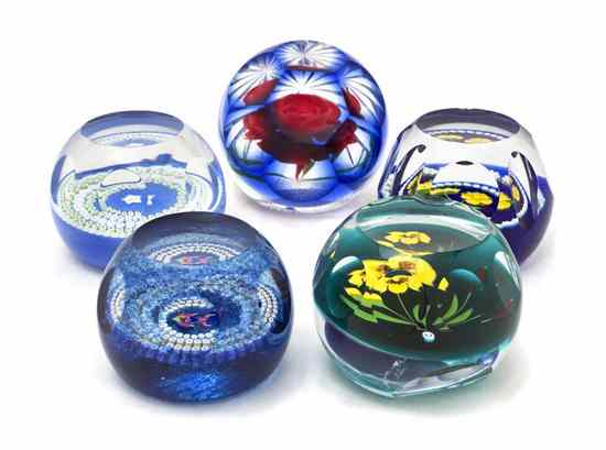 Appraisal: Five Caithness Glass Paperweights each of spherical form with facets