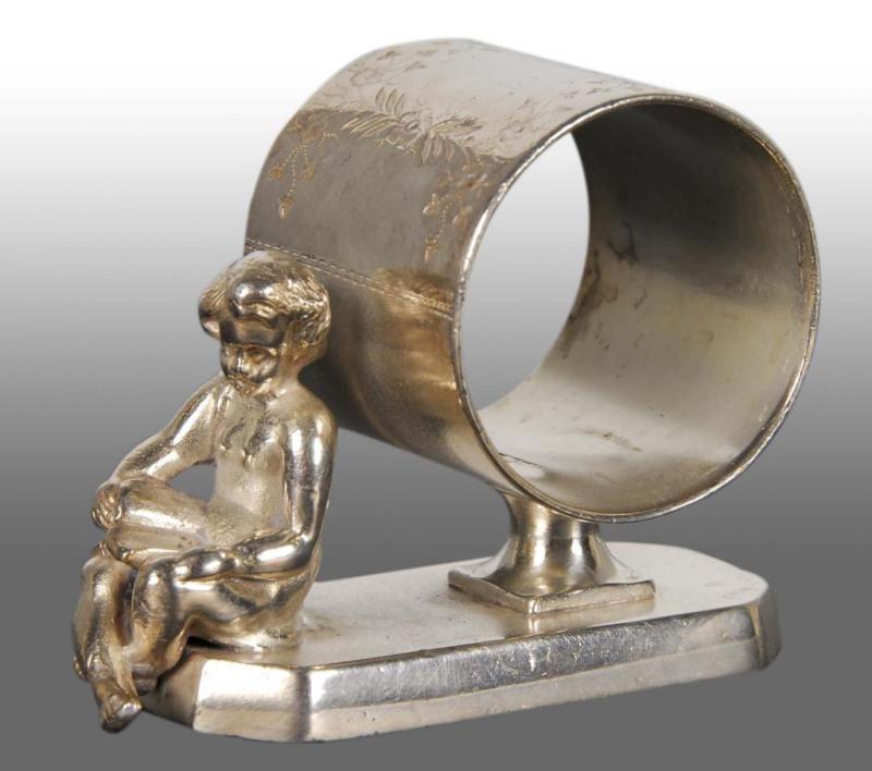 Appraisal: Draped Cherub Young Boy Reading Book Napkin Ring Description Marked