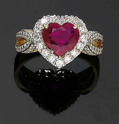 Appraisal: RUBY AND BRILLIANT-CUT DIAMOND RING Yellow gold Fancy ring the