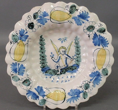 Appraisal: Continental Delft deep plate th c with angel and floral