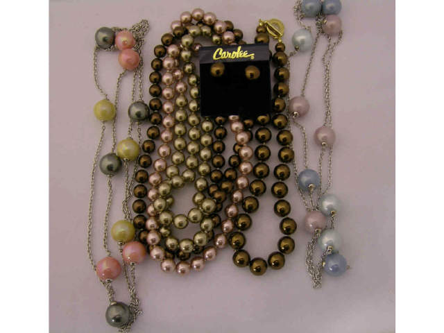 Appraisal: Four costume necklaces and pair of earrings including two brown