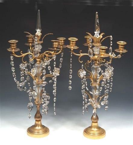 Appraisal: A PAIR OF GILT METAL AND GLASS TABLE CANDLEBRA LUSTRES