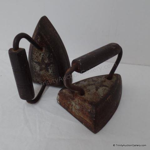 Appraisal: Antique Star Cast Iron Sad Irons Both sad irons are