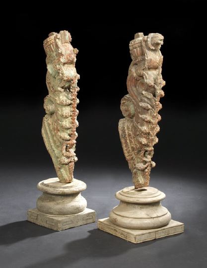 Appraisal: Elaborate Pair of Indian Carved and Painted Wooden Corbels mid-