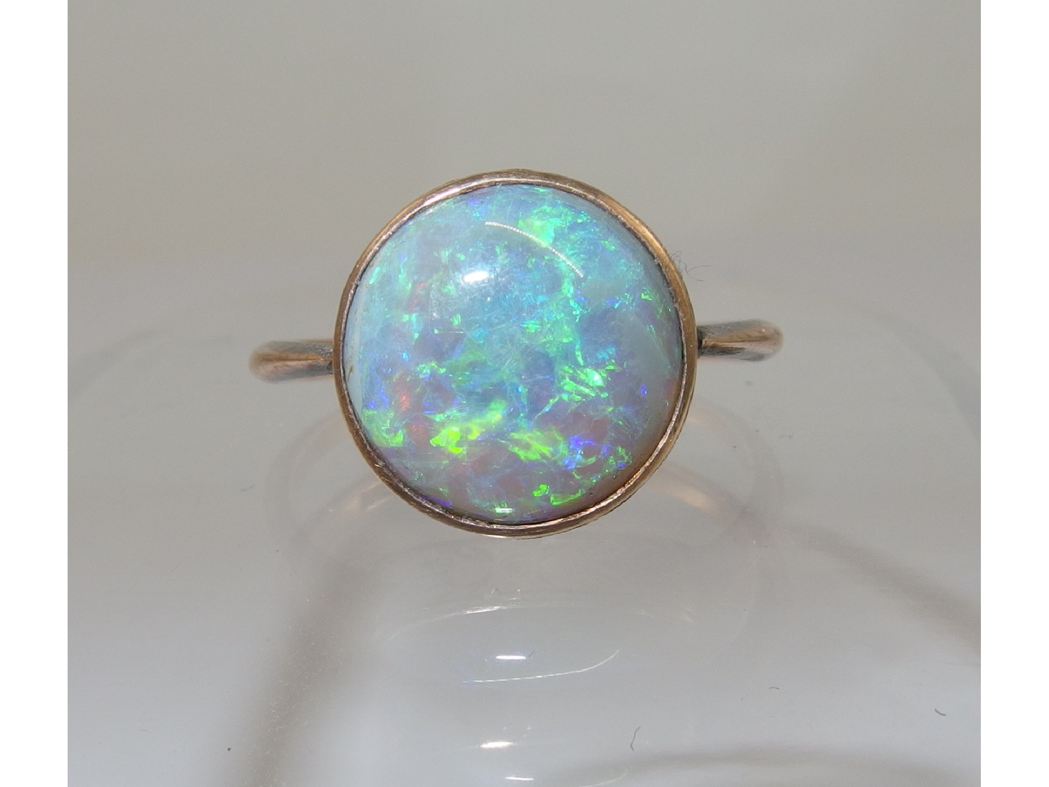 Appraisal: A Black opal cabouchon in a ct rose gold vintage