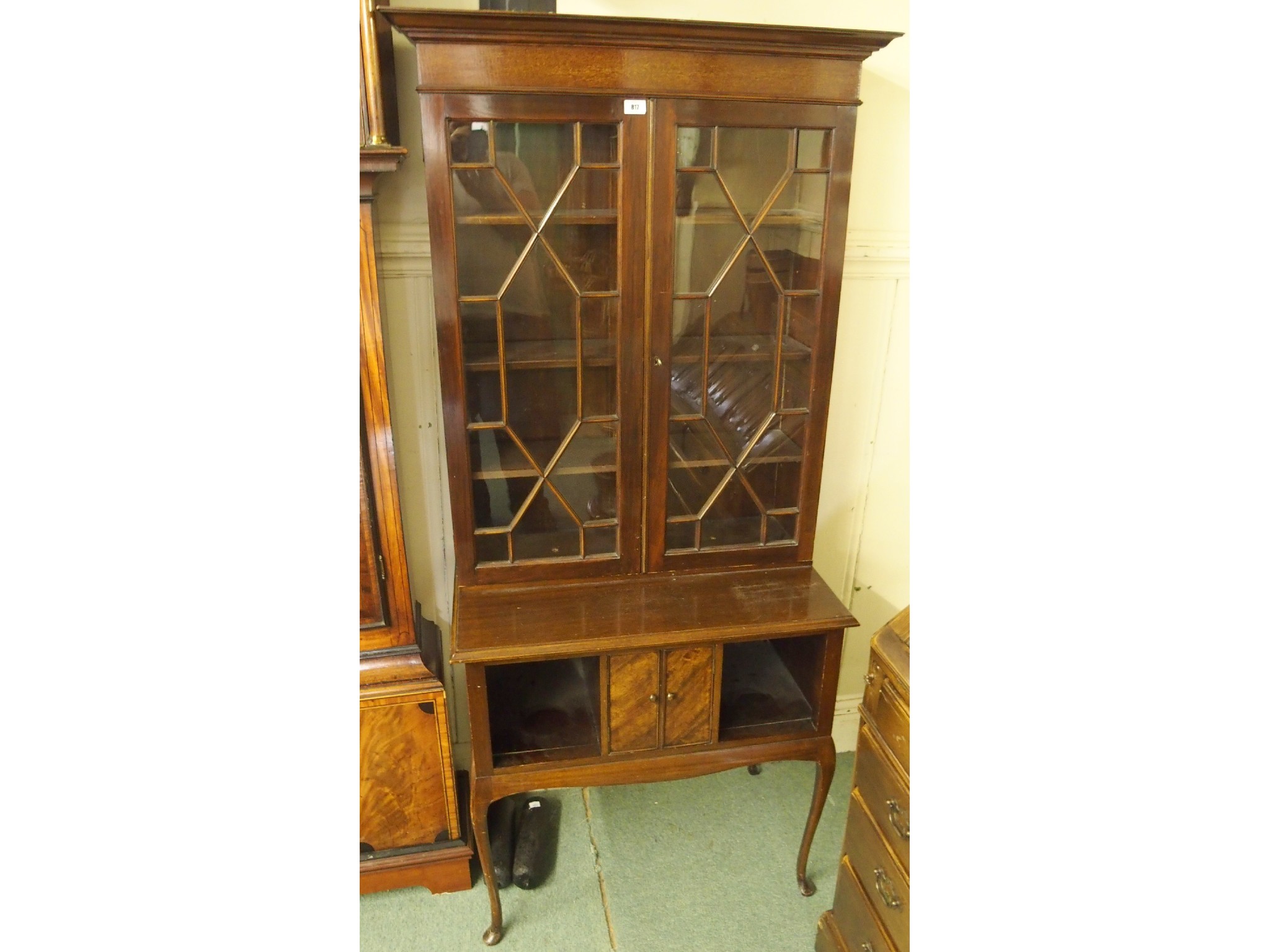 Appraisal: An Edwardian mahogany astragal glazed bookcase on stand x x