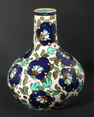 Appraisal: A Burmantoft's Faience Persian bottle vase designed by Leonard King