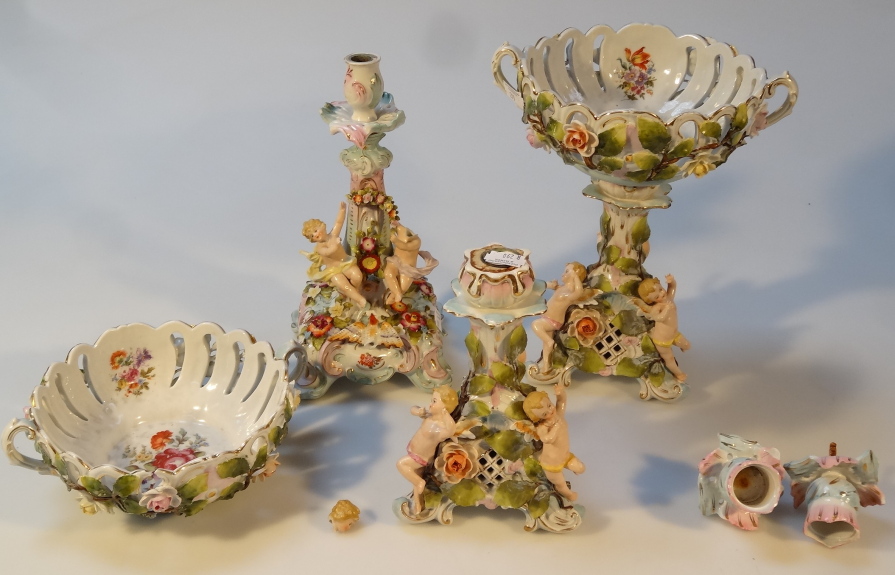 Appraisal: An early thC Sitzendorf porcelain candlestick with an urn top