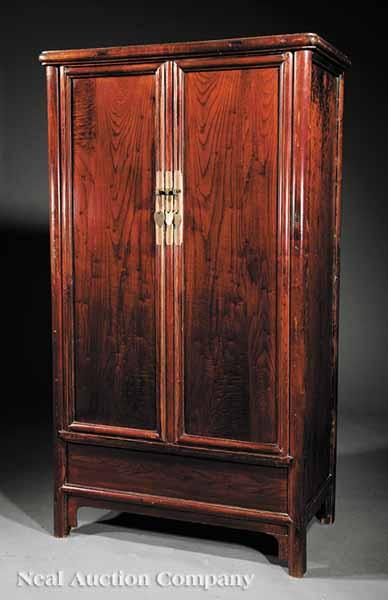 Appraisal: An Antique Ming-Style Hardwood Red Lacquered Cabinet molded top paneled