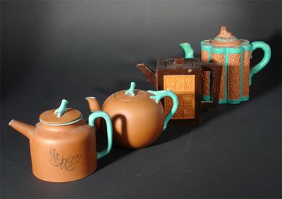 Appraisal: A Watcombe Torquay terracotta Japoniste teapot and cover the design