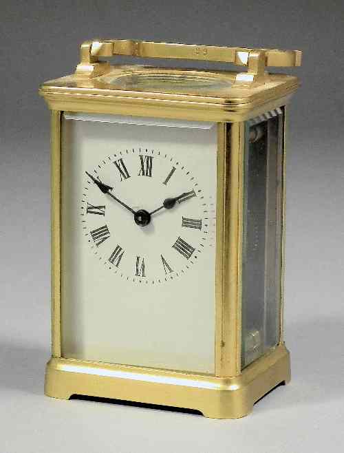 Appraisal: An early th Century French carriage timepiece the white enamelled