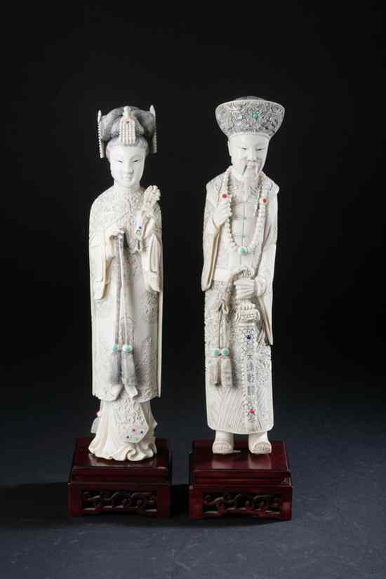 Appraisal: PAIR CHINESE IVORY FIGURES OF EMPEROR AND EMPRESS - in