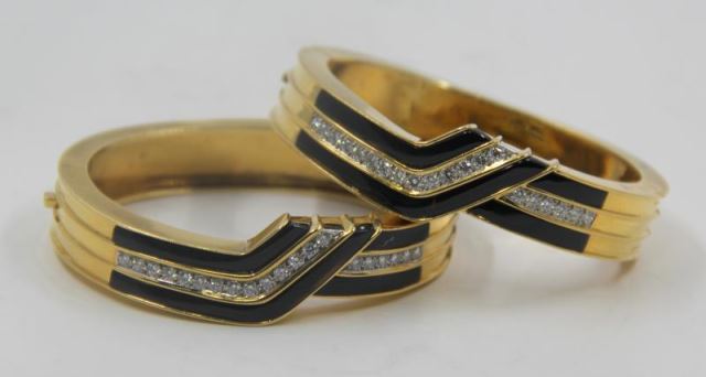 Appraisal: JEWELRY Pair of kt Gold Diamond and OnyxBracelets Pair of