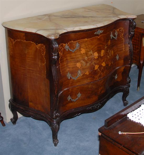 Appraisal: A French Marquetried Commode having a molded edge to the