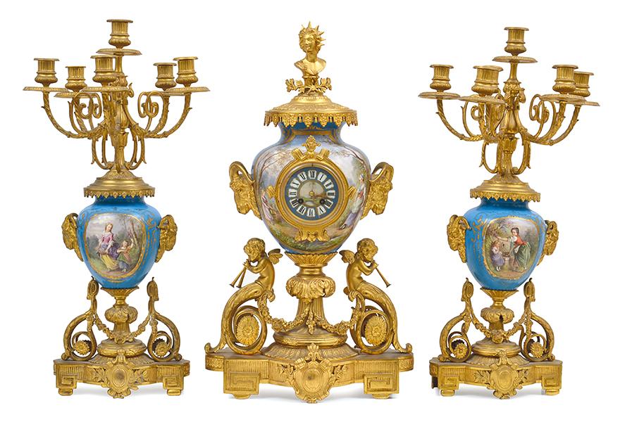 Appraisal: AN IMPRESSIVE SEVRES STYLE THREE PIECE GILT METAL MOUNTED CLOCK