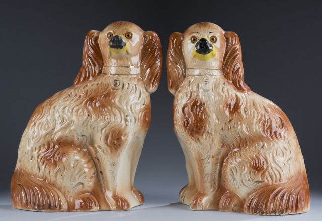 Appraisal: Pair of th Century Staffordshire Spaniels Crazing according to age