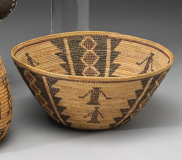 Appraisal: A Yokut polychrome basket With three columns of rattlesnake bands