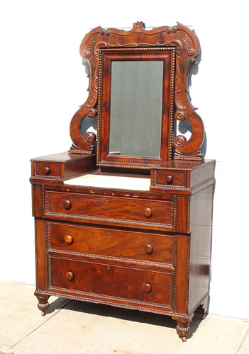 Appraisal: VICTORIAN MAHOGANY VENEER MARBLE TOP CHEST WITH MIRROR Drop center