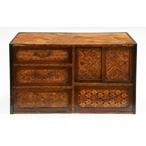 Appraisal: A Japanese parquetry table cabinet Meiji period fitted with drawers