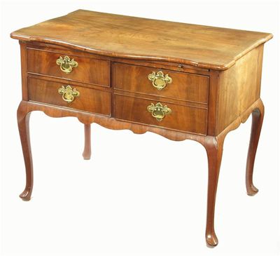 Appraisal: A mahogany dressing table in George II style the moulded