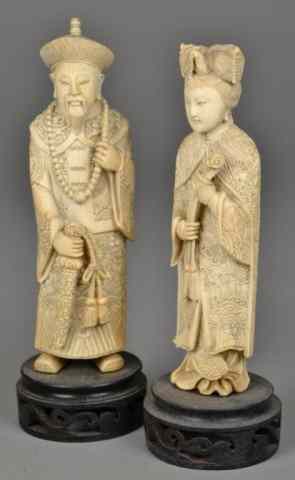 Appraisal: Pair Of Chinese Carved Ivory FiguresFinely carved to depict an