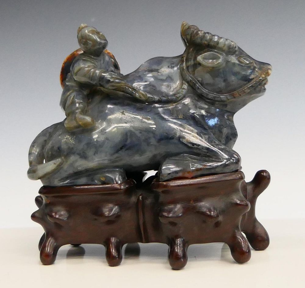 Appraisal: CHINESE BLUISH SEATED JADE OX w RIDER SCULPTURE Chinese carved