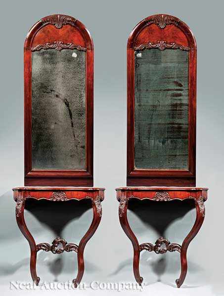 Appraisal: A Pair of Louis Philippe Carved Mahogany and Mirrored Console