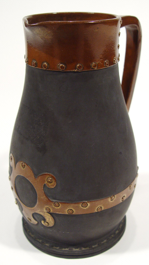 Appraisal: Doulton Lambeth Siliconware leatherjack jug with relief moulded decoration impressed