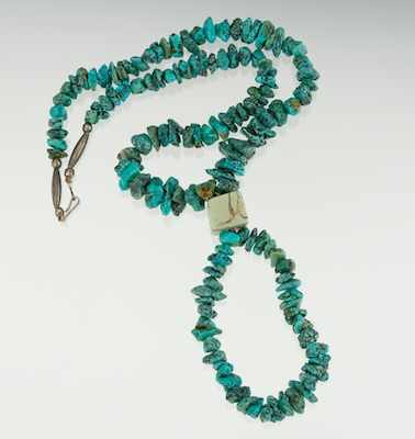 Appraisal: A Turquoise Bead and Silver Necklace Graduated in size from