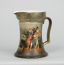 Appraisal: Royal Bayreuth Bavaria Pitcher Pretty brown pitcher featuring two musicians