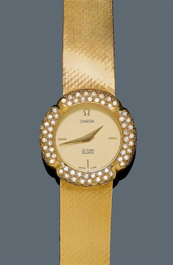 Appraisal: DIAMOND LADY'S WRISTWATCH OMEGA DE VILLE s Yellow gold Ref