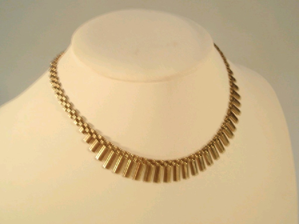 Appraisal: A ct gold graduated brickette necklace g