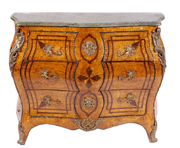 Appraisal: A Louis XV style gilt bronze mounted mixed wood marble