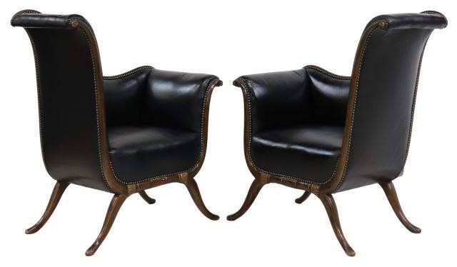 Appraisal: pair Empire style upholstered armchairs th c having asymmetrical rolled