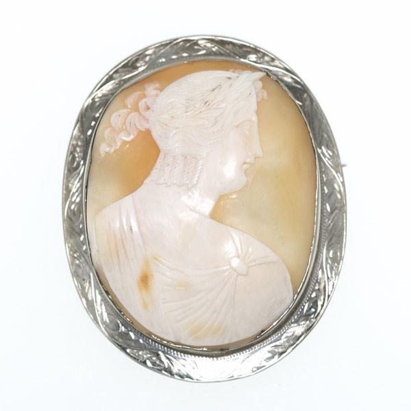 Appraisal: SHELL CAMEO BROOCH Engraved k wg frame ca gs GW