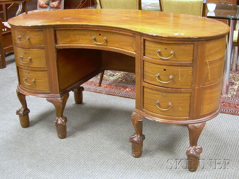 Appraisal: Late Victorian Carved and Inlaid Mahogany Kidney-shaped Desk with Claw