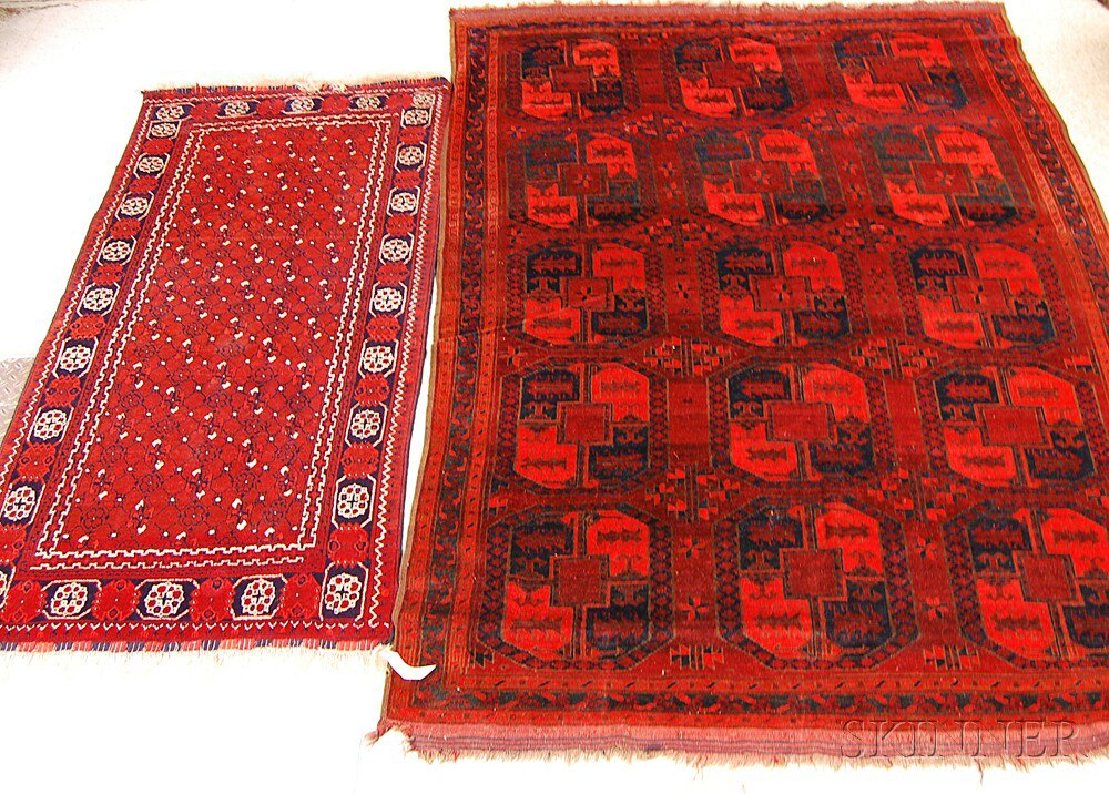 Appraisal: Two Afghan Rugs early th century corner gouge at bottom