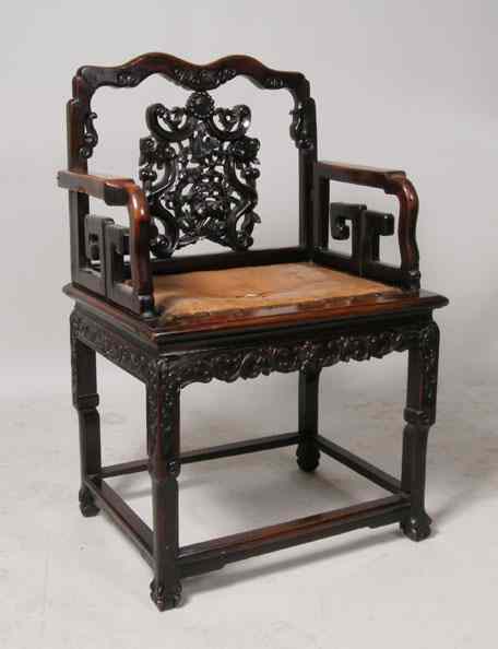 Appraisal: A Chinese Rosewood Open Armchair circa having a serpentine crest