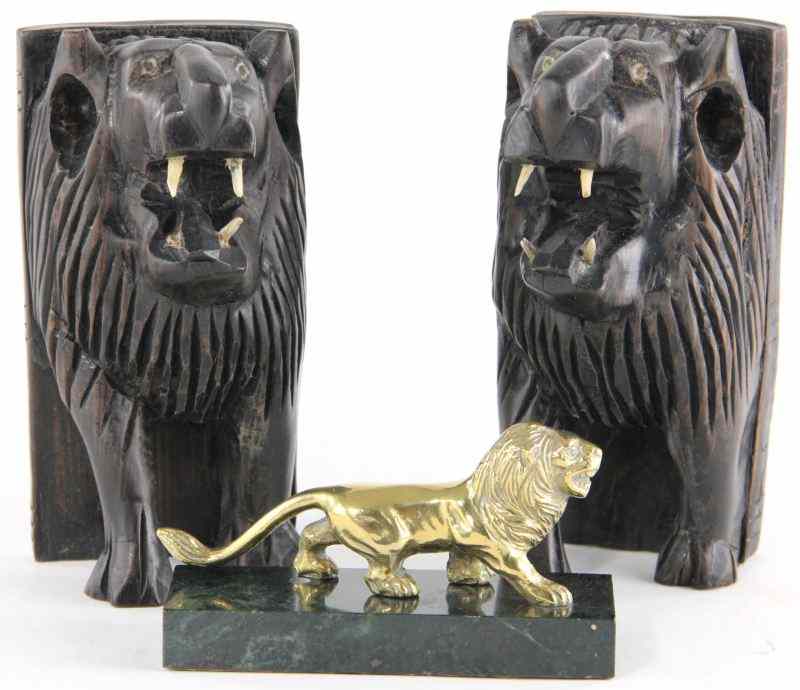 Appraisal: Three Table Articlesincluding pair of carved bookends lion form exotic