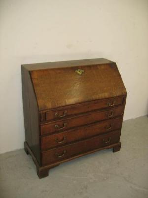 Appraisal: A GEORGE III OAK AND MAHOGANY BANDED BUREAU the fall