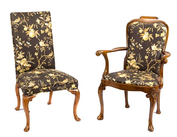 Appraisal: A set of ten George II style walnut dining chairs