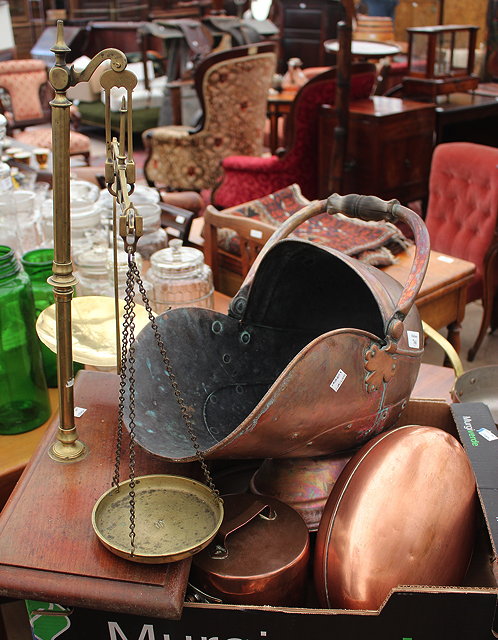 Appraisal: A COPPER COAL SCUTTLE together with lidded copper saucepan a