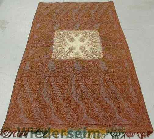 Appraisal: Large paisley homespun table cover with a square ivory center