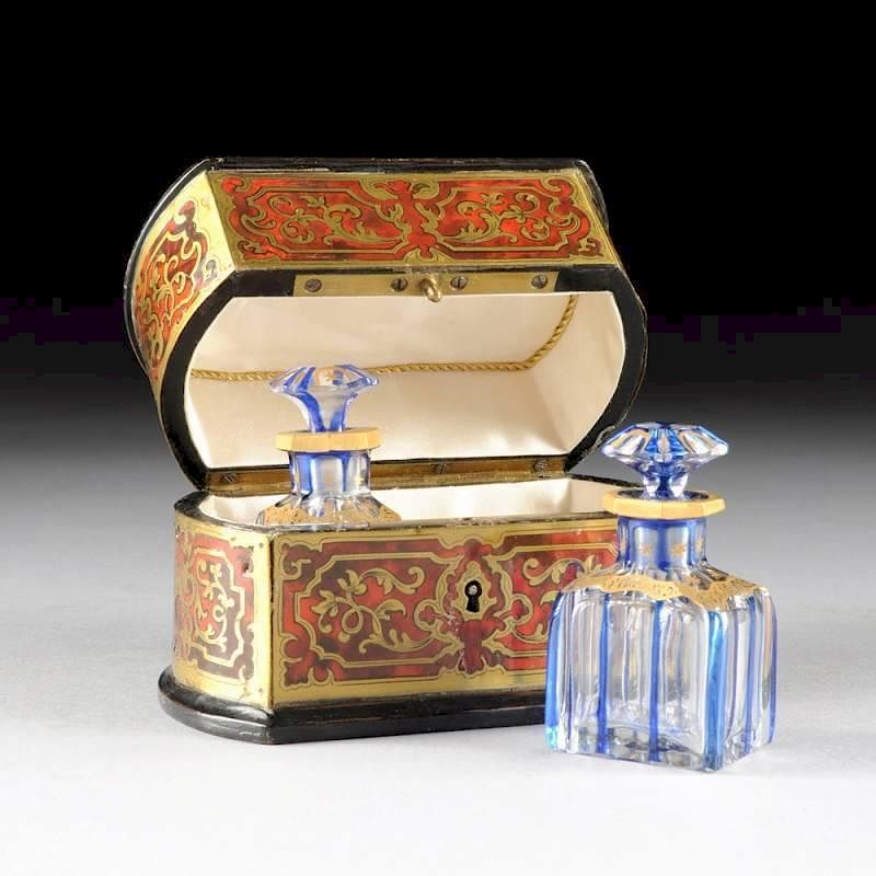 Appraisal: A FRENCH FAUX TORTOISESHELL AND BRASS BOULLE INLAYED TWO BOTTLE