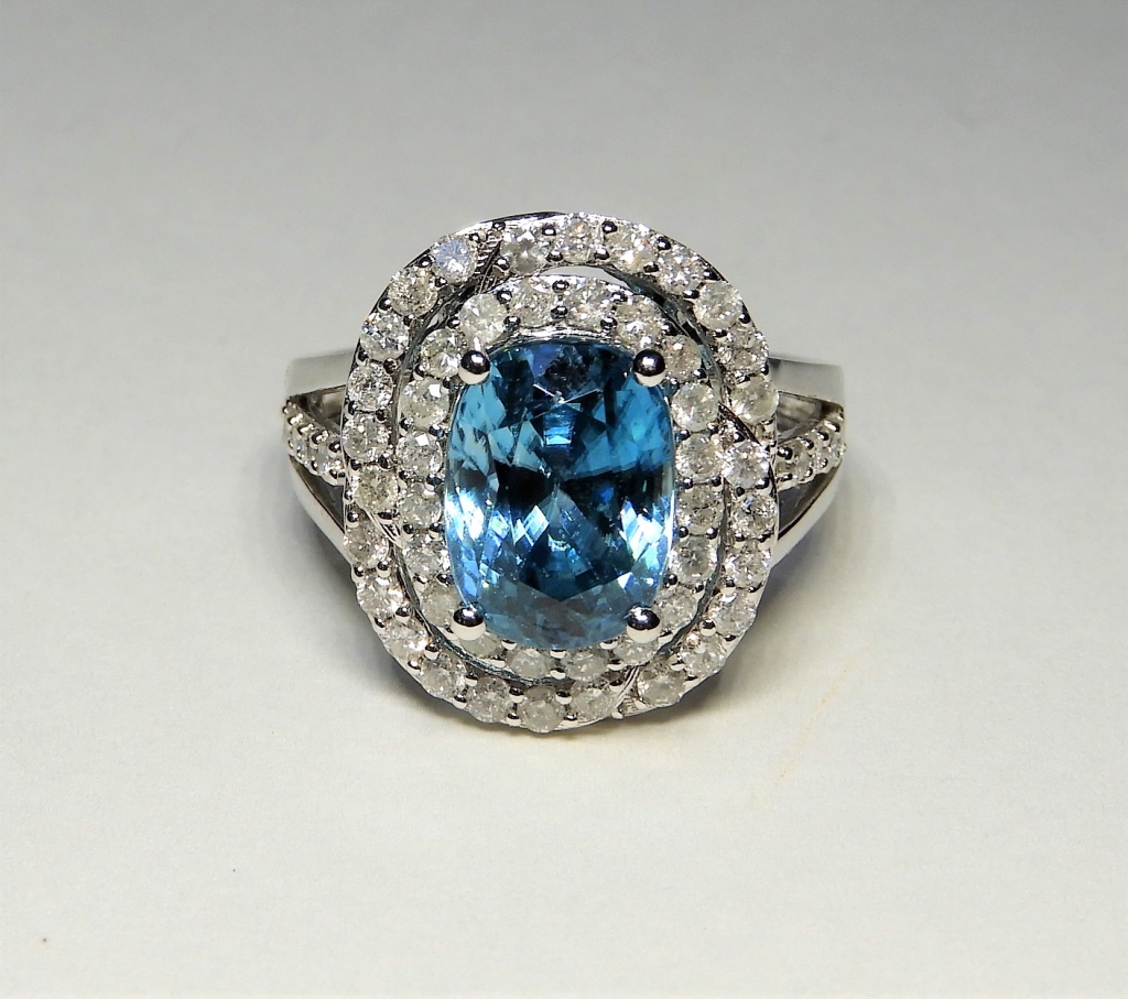 Appraisal: K WHITE GOLD BLUE ZIRCON DIAMOND COCKTAIL RING United States