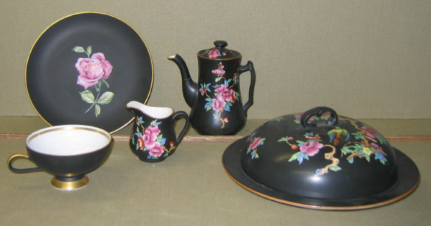 Appraisal: ENGLISH BLACK GROUNDED DEVONWARE POTTERY S Fielding Stoke on Trent