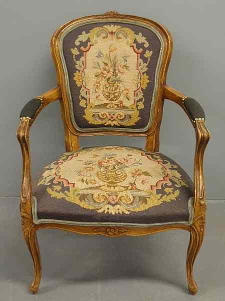 Appraisal: French fruitwood fauteuil with a needlepoint back and seat h