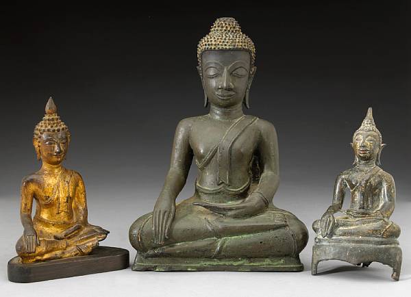 Appraisal: Three Thai bronze seated figures of Buddha Each seated dhyanasana