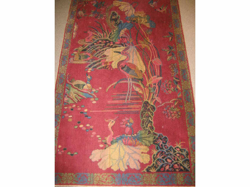 Appraisal: CHINESE DIRECTIONAL AREA RUG Showing ducks and other wild birds