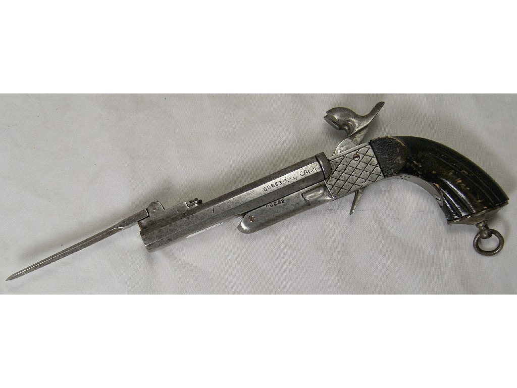 Appraisal: A th century calibre pocket pistol with octagonal twin barrels